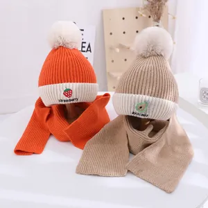 Cozy winter knit hat and scarf set for children with cute strawberry and avocado embroidery