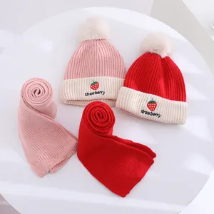 Detailed embroidery of strawberry pattern and knit texture on children winter hat set
