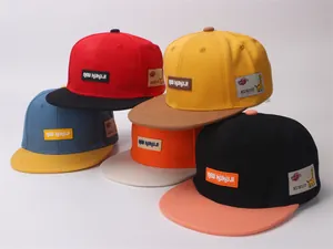 Detailed view of various color-block flat brim baseball caps with NEW KUKUJI embroidery