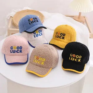 Detail of warm lamb wool kids baseball caps with Good Luck embroidery in six colors