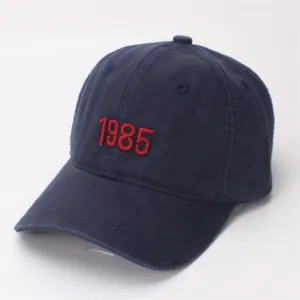 Classic navy cotton baseball cap with red 1985 embroidery on high-quality twill fabric