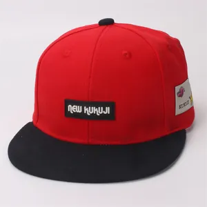 Kids flat brim baseball hat with red and black color contrast and KUKUJI letter patches