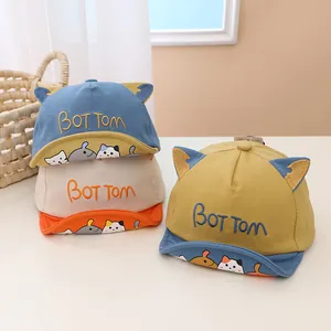 Soft brim baby baseball cap with cartoon cat ears and BOT TOM embroidery for toddlers