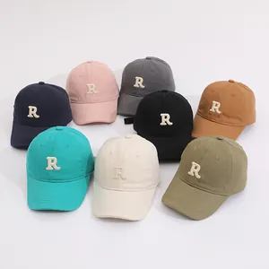 Detailed collection of kids cotton baseball caps with embroidered R letter in 8 candy colors