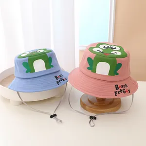 Cartoon frog children bucket hats in blue and pink with adjustable chin straps