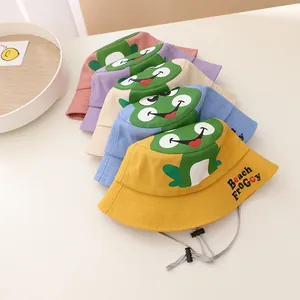 Close-up of colorful cartoon frog bucket hats for kids with adjustable windproof chin straps