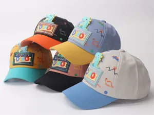 Collection of children's cartoon dinosaur baseball caps in five vibrant color combinations