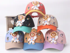 Detail view of colorful space bear baseball caps for kids with 3D astronaut bear design