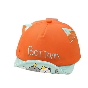 Orange and blue baby baseball cap with 3D ears and cartoon cat embroidery detail