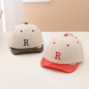 Infant cotton baseball cap with embroidered letter R and soft contrast brim for sun protection