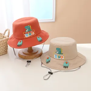 Süßer Kinder-Anglerhut mit Dino-Motiv in Orange und Beige inklusive verstellbarem Band