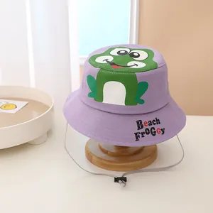 Detail view of purple kids frog bucket hat with Beach FROGGy print and windproof strap