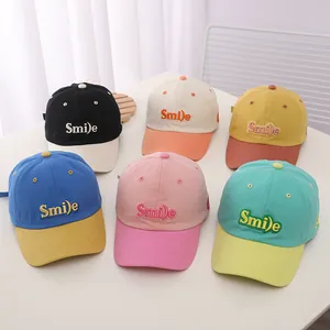 Collection of kids smile baseball caps in various vibrant colors with 3D embroidery detail