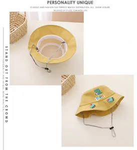 Detailansicht gelber Kinder-Sonnenhut mit Netzfutter und verstellbarem Kinnriemen für Babys