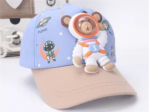 Detailed view of kids space bear baseball cap with 3D astronaut doll and planet patterns