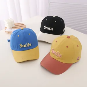 Detailed embroidery of Smile lettering on stylish two-tone cotton kids baseball caps