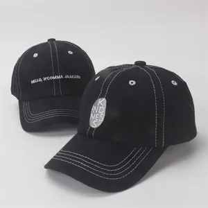 Kids black cotton baseball caps with contrast white stitching and letter embroidery