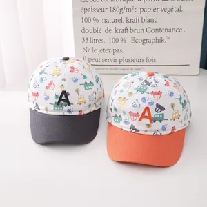 Detailed embroidery of letter A on children cotton baseball cap with cartoon car patterns