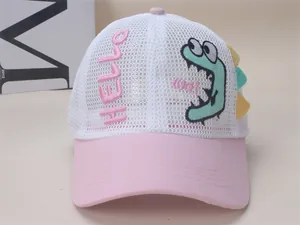 Detail view of cartoon dinosaur embroidery on breathable mesh kids baseball cap
