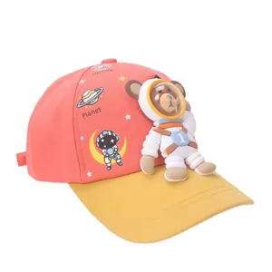 Kids space themed baseball cap featuring a 3D astronaut bear and planet prints