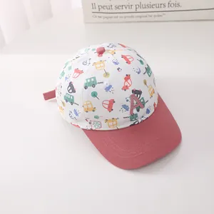 Detailed close-up of pink and white kids cotton baseball cap with letter A embroidery