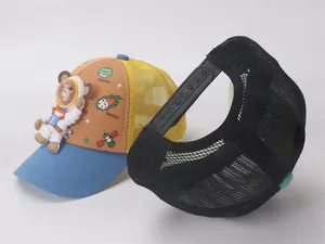 Detail of kids mesh trucker hat showing 3D astronaut bear and adjustable snapback closure