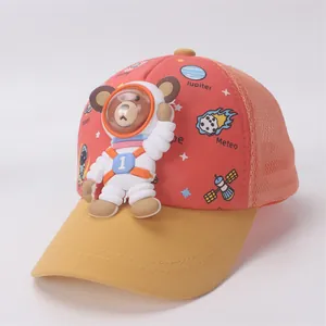 Detail of kids baseball cap featuring 3D cartoon astronaut bear and space theme prints