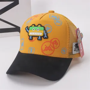 Detail of children's mesh baseball cap featuring pixel robot embroidery and yellow crown