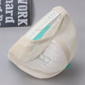 Detail of breathable mesh and adjustable snapback closure on kids baseball cap