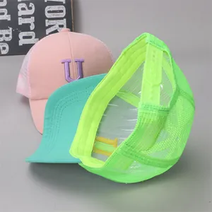 Detail view of mesh baseball cap with adjustable strap and breathable polyester mesh fabric