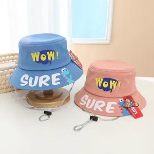 Kids cotton bucket hat set with WOW letter print and dinosaur icons in pink and blue