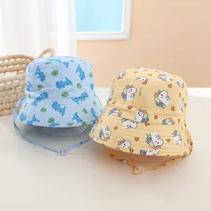 Japanese style kids bucket hats with cartoon dinosaur and unicorn patterns and chin straps