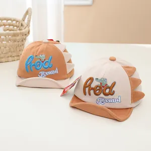 Cute set of two toddler dinosaur baseball caps with soft brims and crocodile embroidery