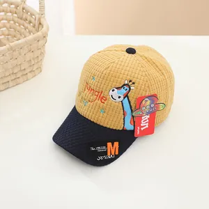 Detail of children's corduroy baseball cap with giraffe embroidery and jungle text