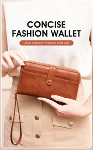 Close-up of vintage brown long zipper wallet with wristlet and large card capacity