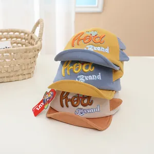 Detail of baby baseball caps with cute 3D frog embroidery and various color combinations