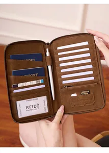 Detailed view of the brown RFID blocking travel wallet with multiple slots for passports and cards
