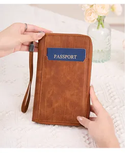 Portefeuille de voyage RFID en cuir marron vintage avec dragonne et poche extérieure pratique