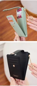 Close-up of slim foldable PU leather card holder showing card slots and side zipper pocket