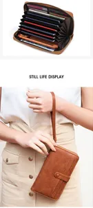 Detailed view of large capacity brown leather wallet with multi-card slots and wrist strap