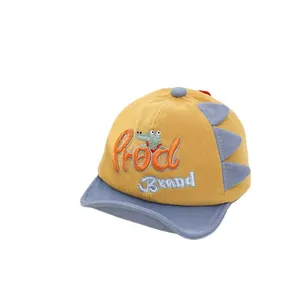 Cute yellow and blue dinosaur themed baby baseball cap with Frog Brand embroidery design