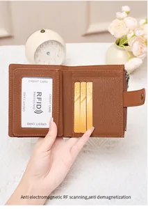 Detail view of RFID protected leather wallet with multiple card slots and clear ID window