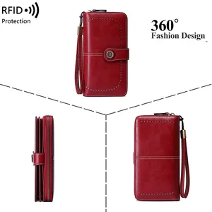 Women's RFID blocking large capacity clutch wallet in deep red pebble grain faux leather