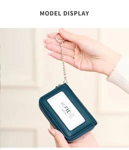 Litchi pattern leather card holder with RFID protection and metal keychain detail