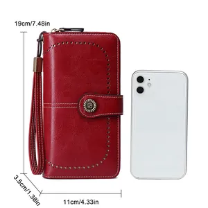 Deep red RFID leather clutch wallet for women with cutout design and 19cm size comparison