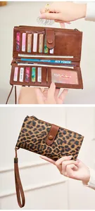 Détail portefeuille femme RFID, cuir marron et léopard avec fentes cartes et dragonne