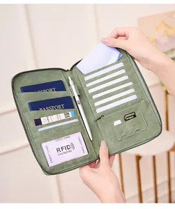 Detail view of RFID blocking passport wallet with multi-slot interior organization