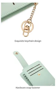 Detail of mint green PU leather card holder with gold keychain and multi-card slots