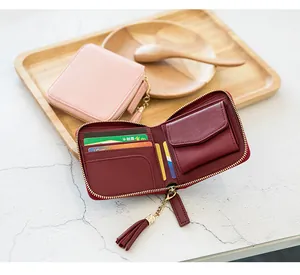 Detailed interior of women's short wallet showing card slots and zipper coin pocket