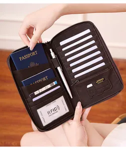 Detailed interior view of a brown RFID passport wallet with multiple card and pen slots
